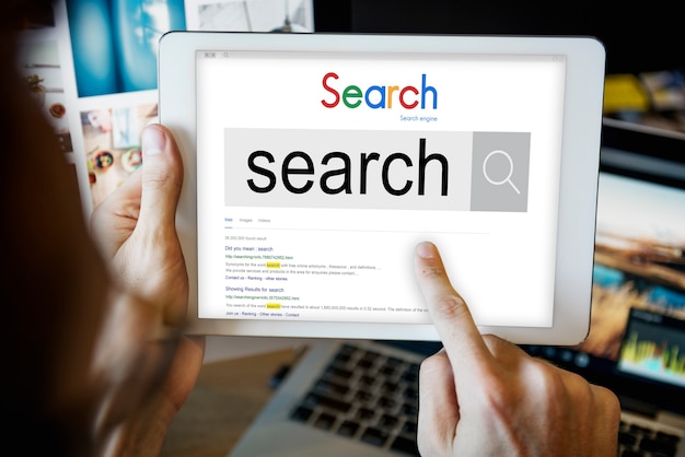 Online search on tablet Free Photo